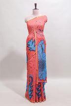 Orange floral design linen cotton saree with self zari border and contrast blouse