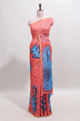 Orange floral design linen cotton saree with self zari border and contrast blouse