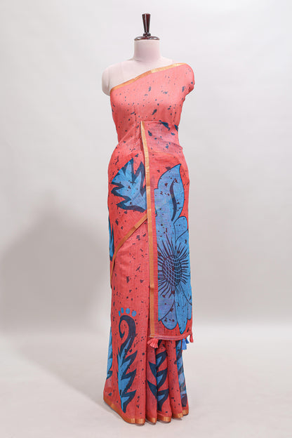Orange floral design linen cotton saree with self zari border and contrast blouse