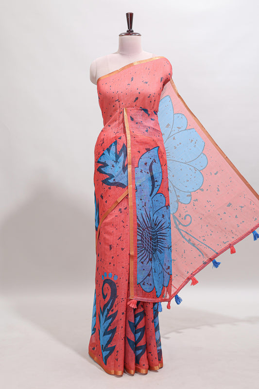 Orange floral design linen cotton saree with self zari border and contrast blouse