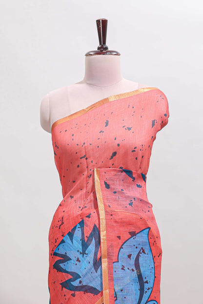 Orange floral design linen cotton saree with self zari border and contrast blouse