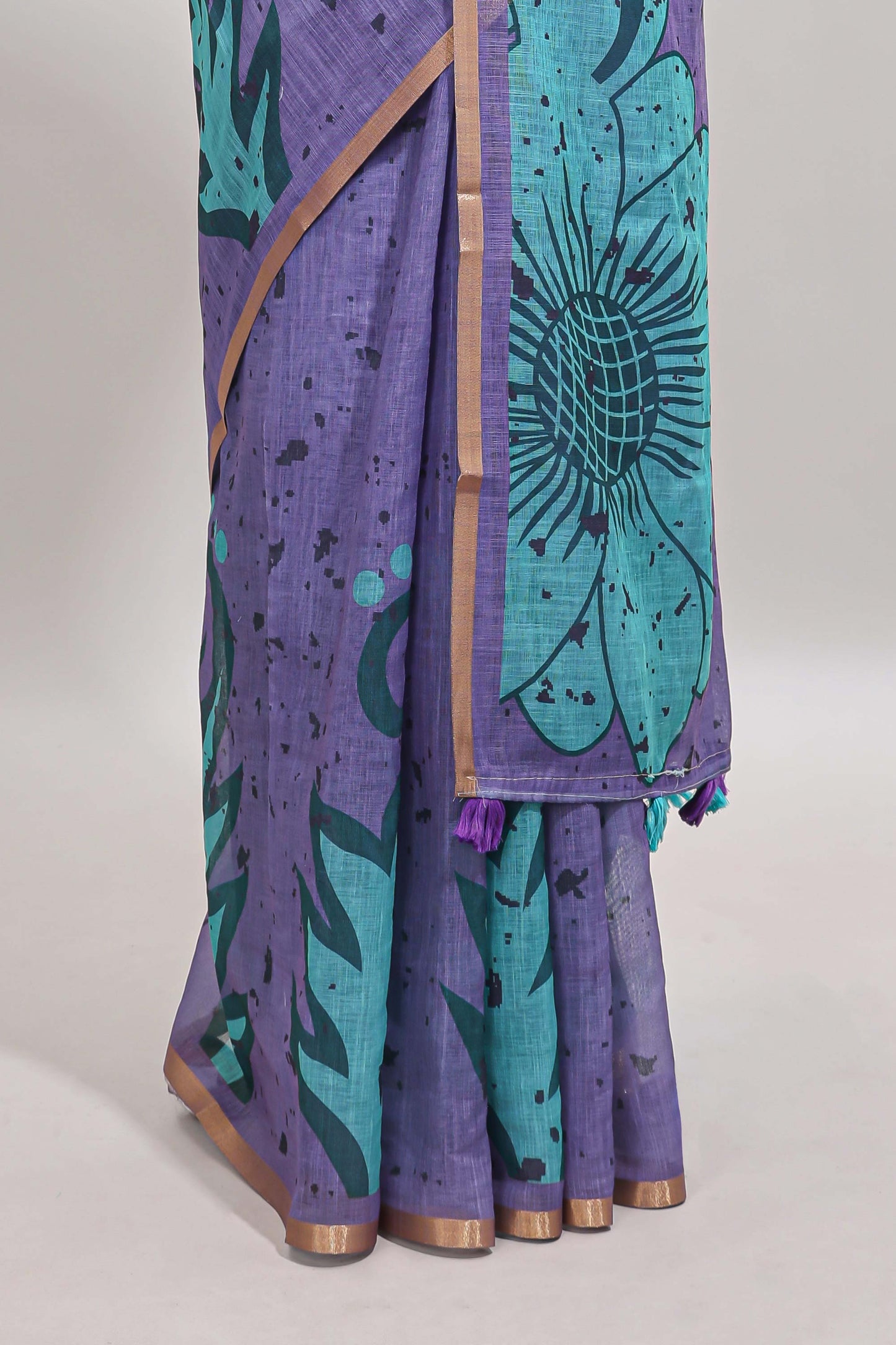 Lavender floral design linen cotton saree with self zari border and contrast blouse