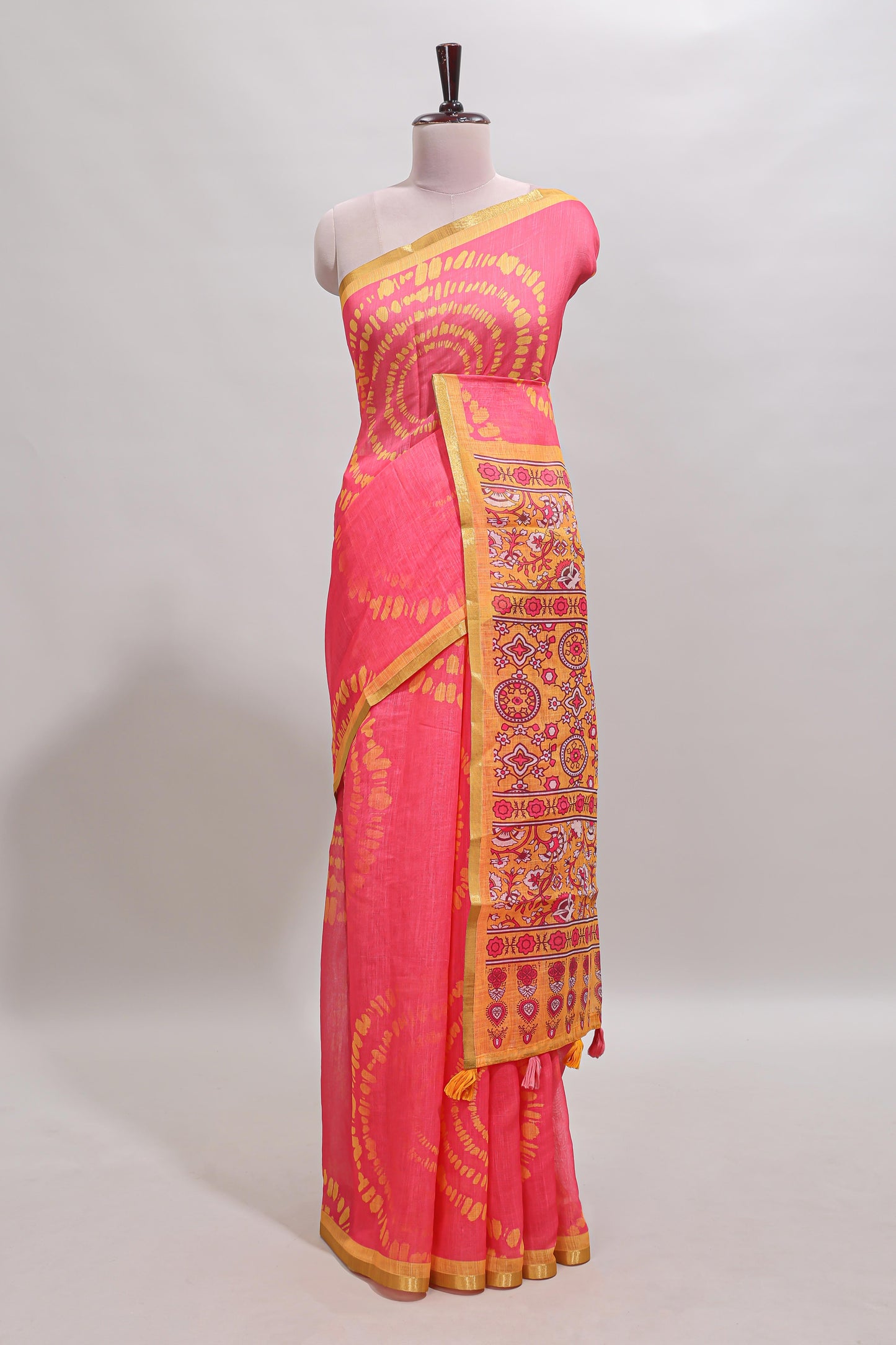 Pink shibori design linen cotton saree with contrast zari border and printed blouse