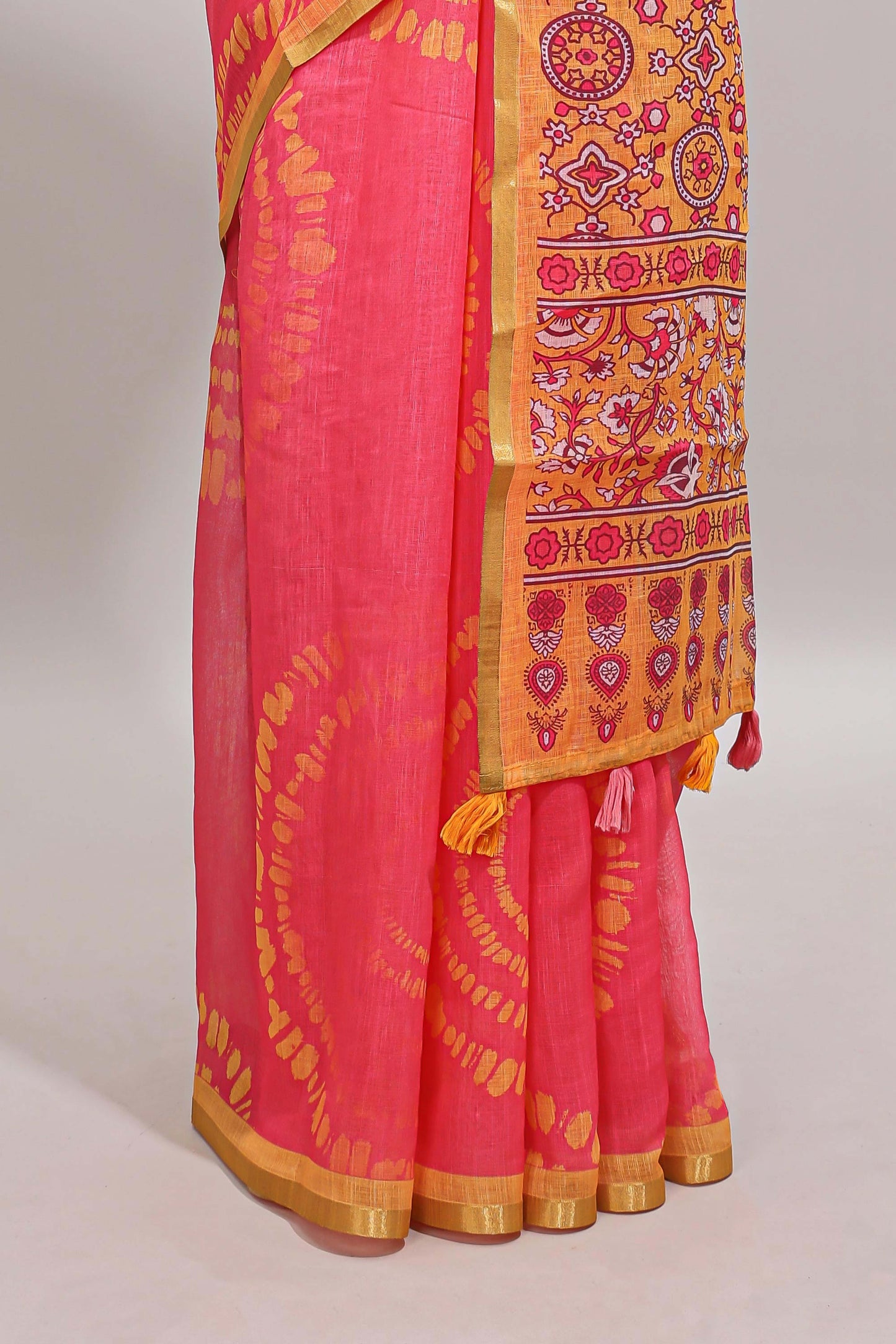 Pink shibori design linen cotton saree with contrast zari border and printed blouse