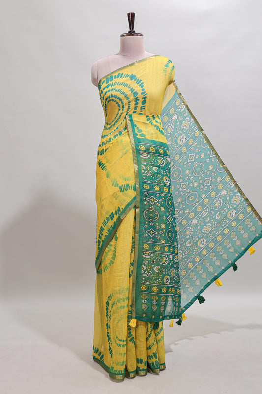 Yellow shibori design linen cotton saree with contrast zari border and printed blouse