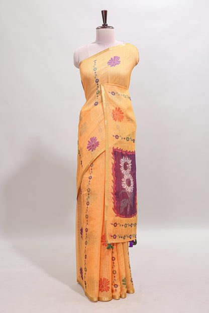 Orange floral design linen cotton saree with self zari border and contrast blouse