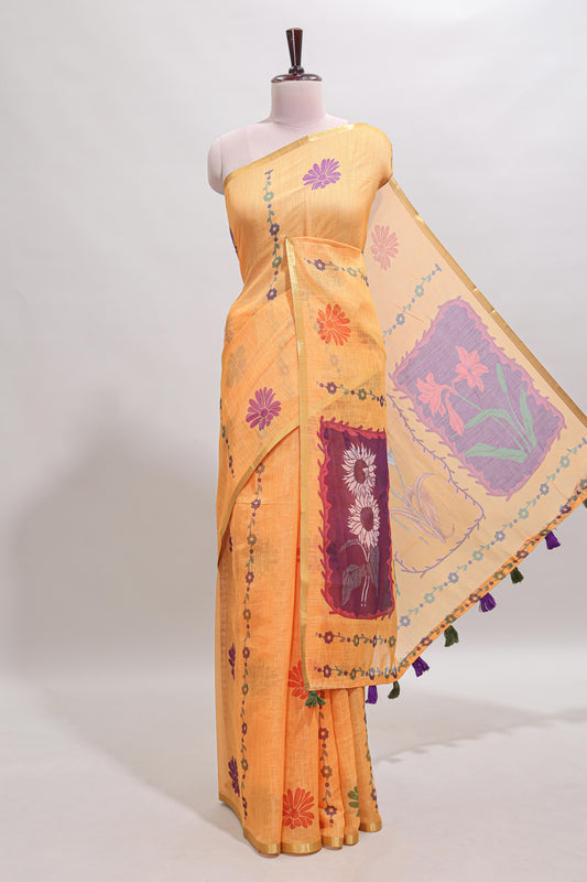 Orange floral design linen cotton saree with self zari border and contrast blouse