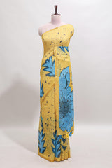 Yellow floral design linen cotton saree with self zari border and contrast blouse