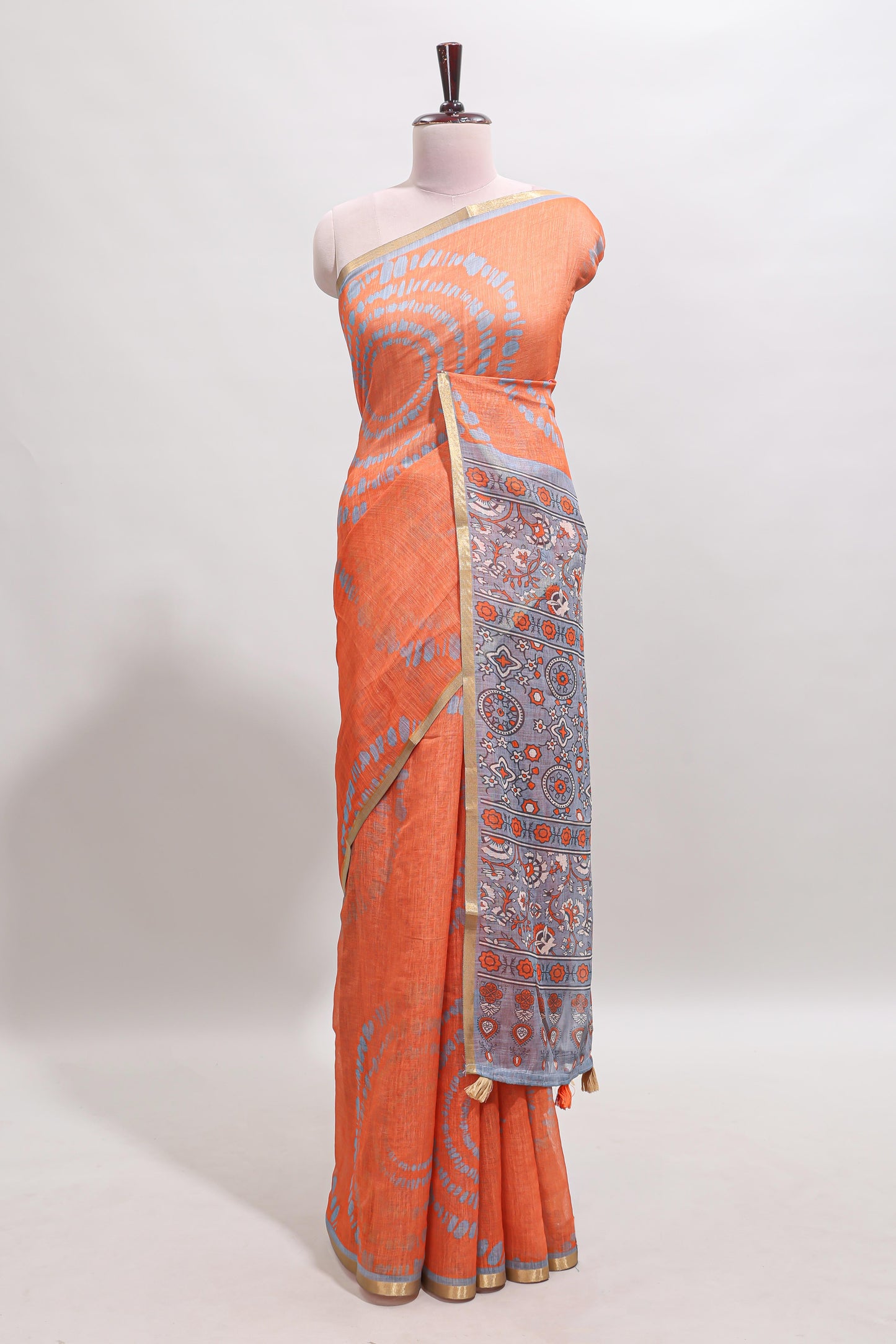 Orange shibori design linen cotton saree with contrast zari border and printed blouse