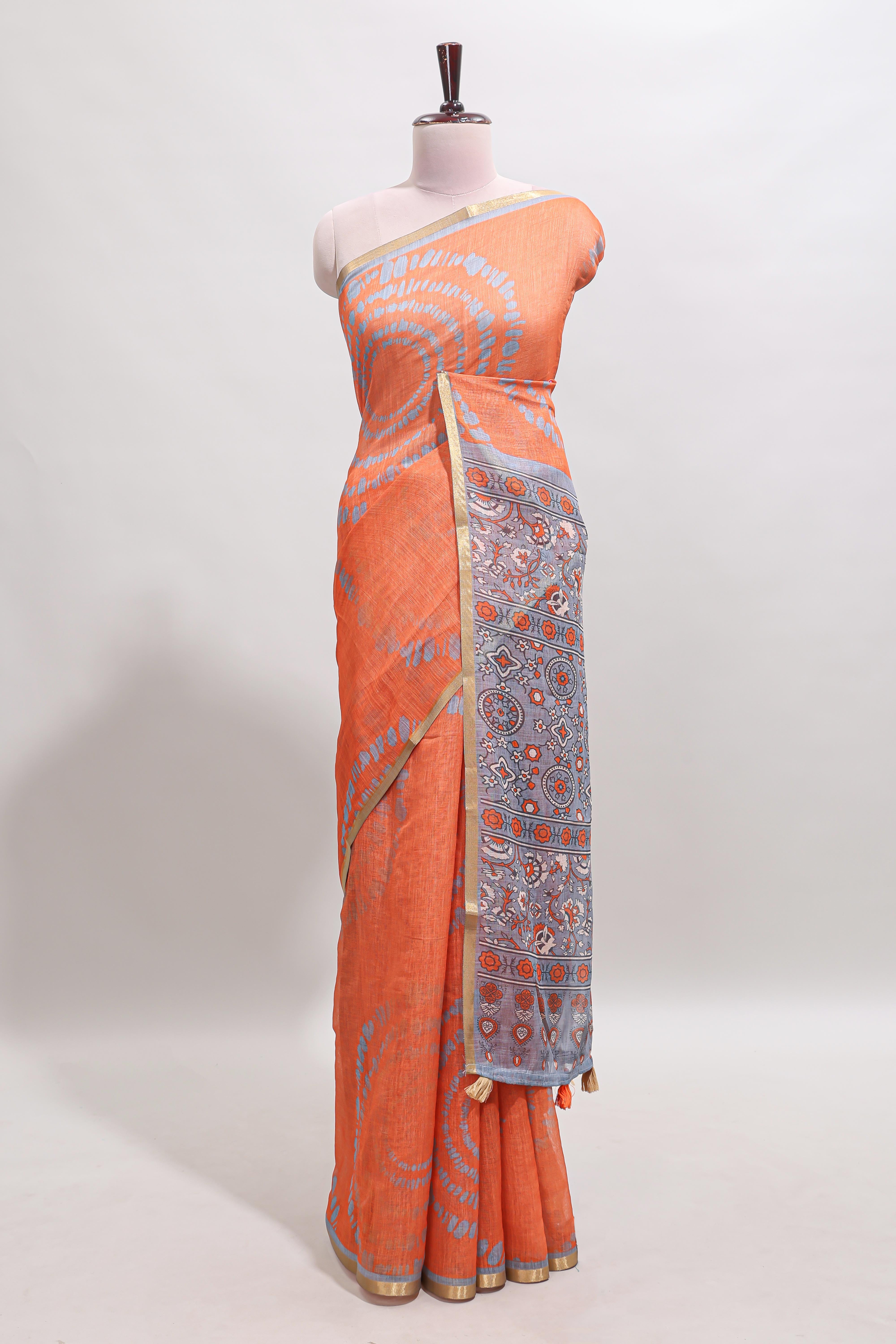 Orange shibori design linen cotton saree with contrast zari border and printed blouse