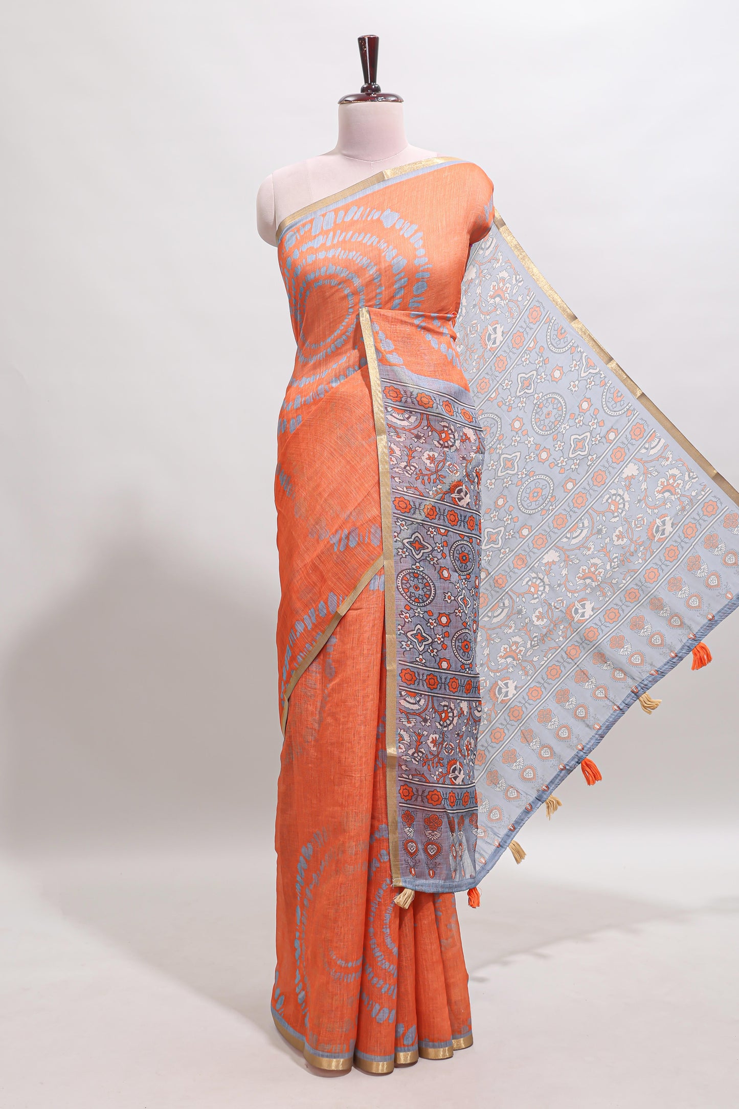 Orange shibori design linen cotton saree with contrast zari border and printed blouse