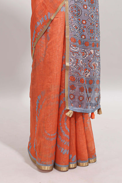 Orange shibori design linen cotton saree with contrast zari border and printed blouse