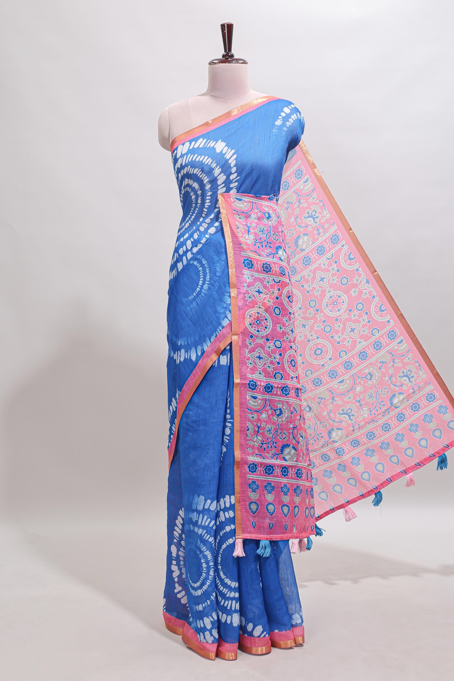 Blue shibori design linen cotton saree with contrast zari border and printed blouse