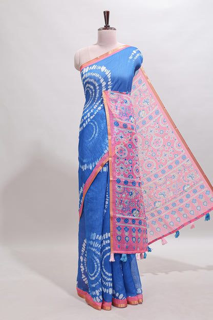Blue shibori design linen cotton saree with contrast zari border and printed blouse