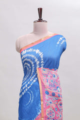 Blue shibori design linen cotton saree with contrast zari border and printed blouse