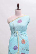 Blue floral design linen cotton saree with self zari border and contrast blouse