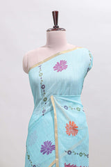 Blue floral design linen cotton saree with self zari border and contrast blouse