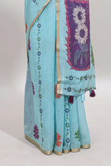 Blue floral design linen cotton saree with self zari border and contrast blouse