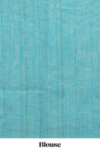 Cream ikkat style linen cotton saree with self zari border and contrast blouse