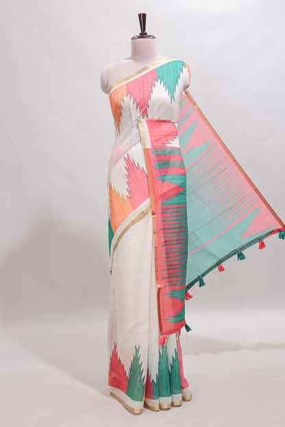 Cream ikkat style linen cotton saree with self zari border and contrast blouse
