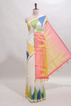 Cream ikkat style linen cotton saree with self zari border and contrast blouse