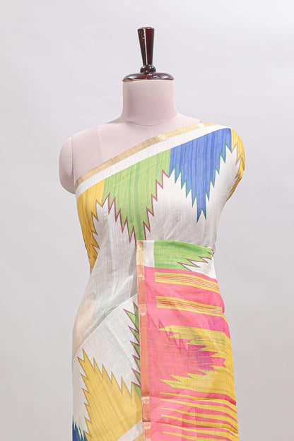Cream ikkat style linen cotton saree with self zari border and contrast blouse