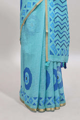 Turquiose green nazar print motifs design linen cotton saree with self zari border and contrast blouse