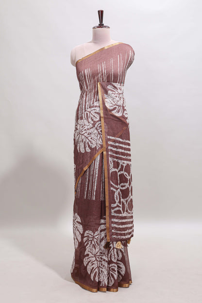 Brown striped & leaf design linen cotton saree with self zari border and contrast blouse
