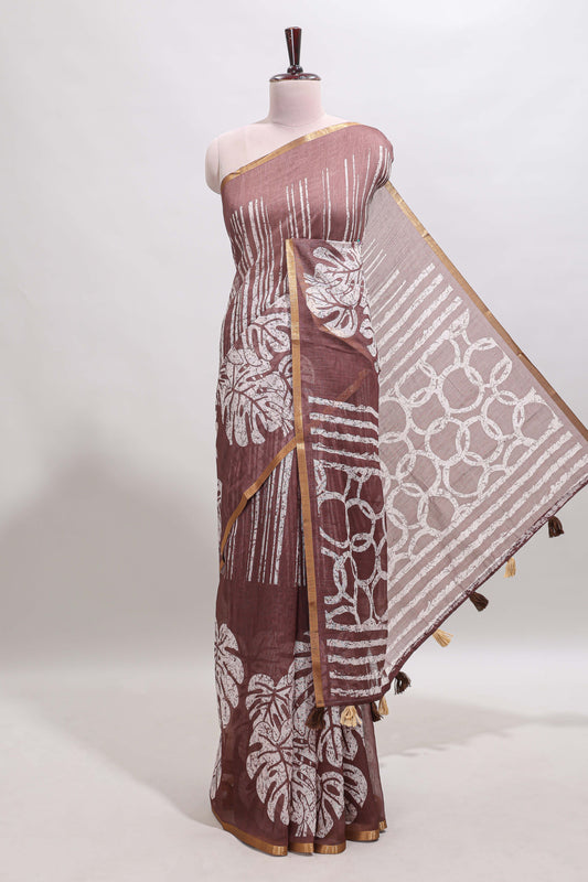 Brown striped & leaf design linen cotton saree with self zari border and contrast blouse