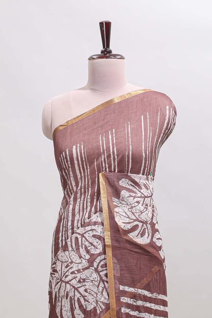 Brown striped & leaf design linen cotton saree with self zari border and contrast blouse