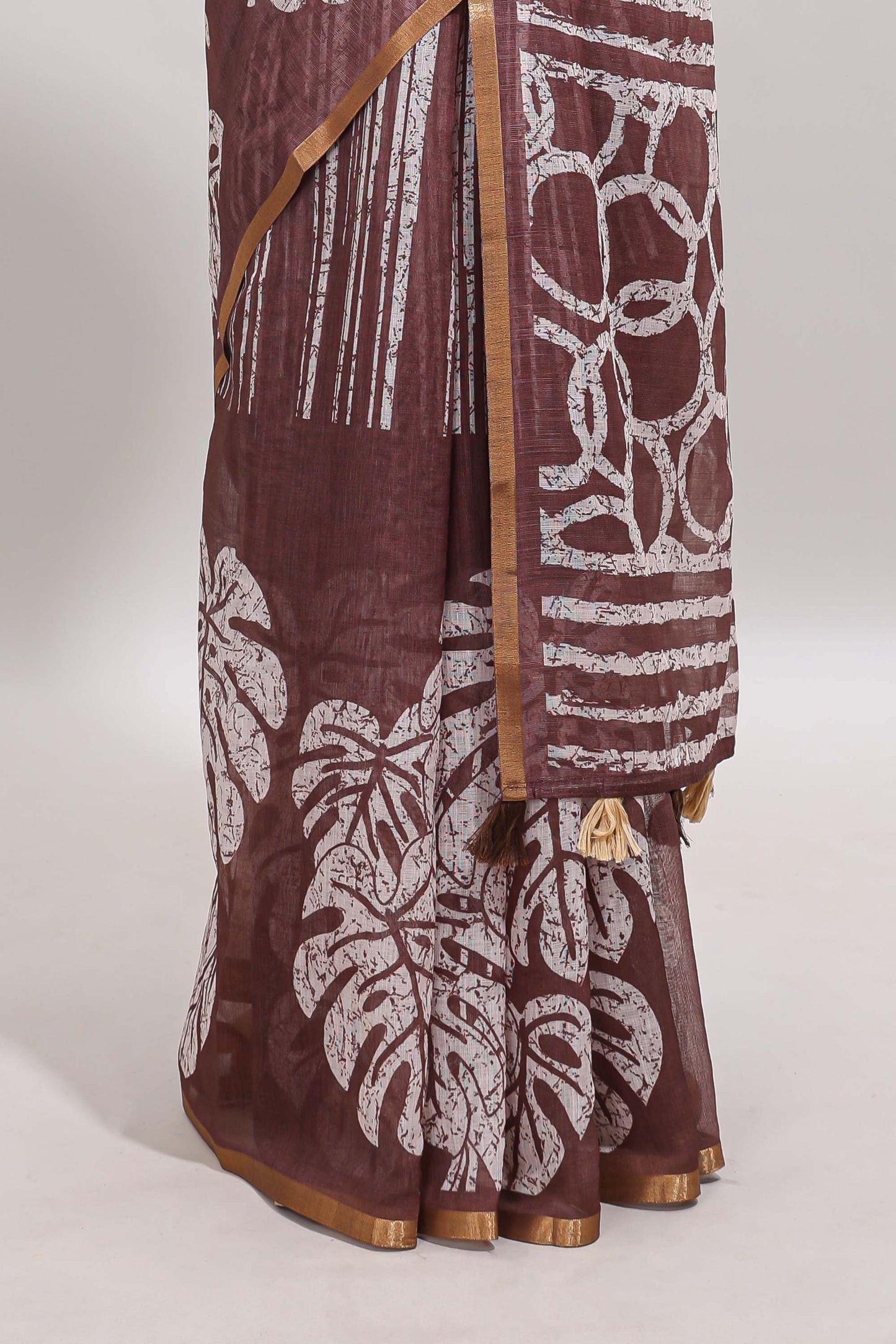 Brown striped & leaf design linen cotton saree with self zari border and contrast blouse