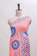 Orange nazar print motifs design linen cotton saree with self zari border and contrast blouse