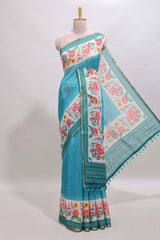 Green checked bottom floral design linen cotton saree with self zari border and matching blouse