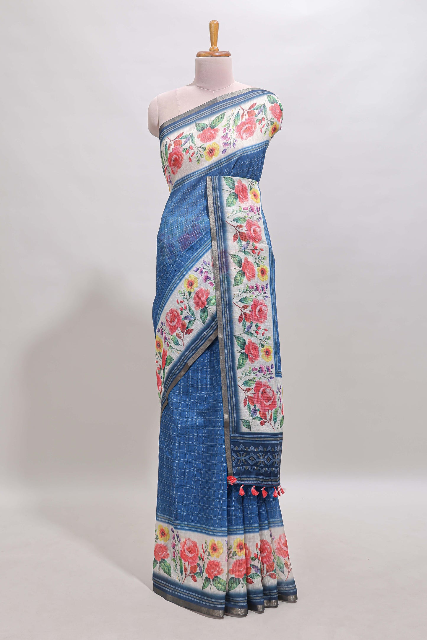 Blue checked bottom floral design linen cotton saree with self zari border and matching blouse