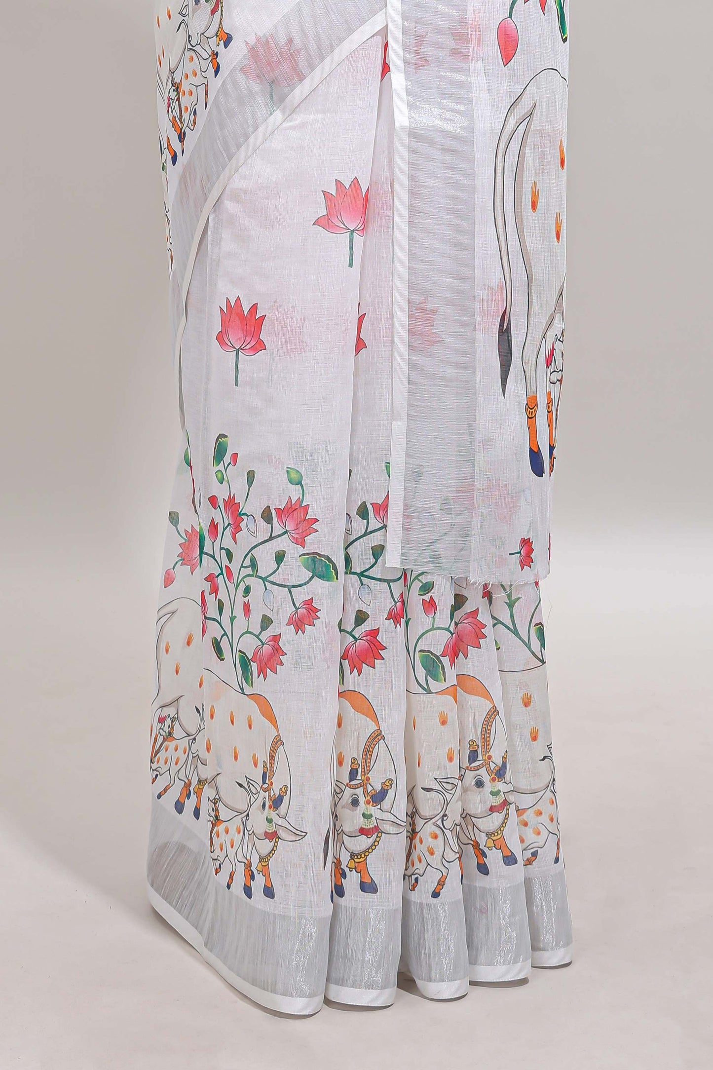 White floral & cow design linen cotton saree with self silver zari border and matching blouse