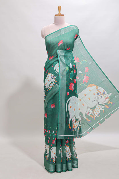 Green floral & cow design linen cotton saree with self silver zari border and matching blouse