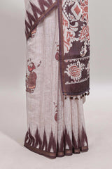 Off white tribal dance dance motifs linen cotton saree with contrast ikkat border and printed pallu