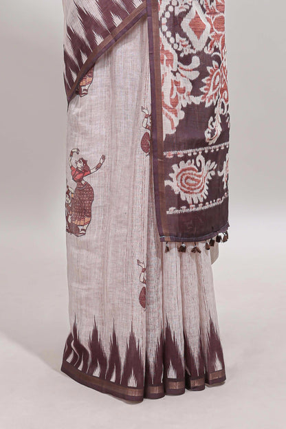 Off white tribal dance dance motifs linen cotton saree with contrast ikkat border and printed pallu
