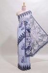 Lavender tribal dance dance motifs linen cotton saree with contrast ikkat border and printed pallu
