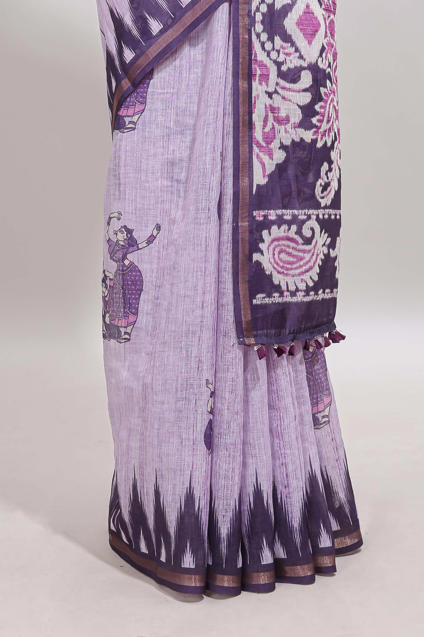 Purple tribal dance dance motifs linen cotton saree with contrast ikkat border and printed pallu