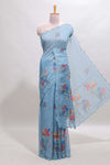 Blue floral design linen cotton saree with scallop border and matching printed blouse