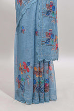 Blue floral design linen cotton saree with scallop border and matching printed blouse