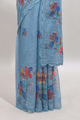 Blue floral design linen cotton saree with scallop border and matching printed blouse