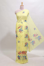 Yellow floral design linen cotton saree with scallop border and matching printed blouse