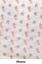 Off white floral design linen cotton saree with scallop border and matching printed blouse