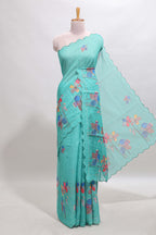 Green floral design linen cotton saree with scallop border and matching printed blouse