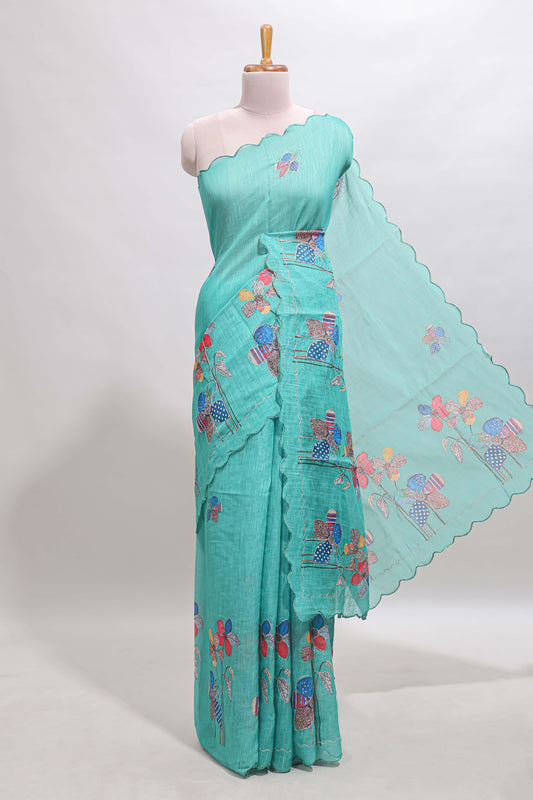 Green floral design linen cotton saree with scallop border and matching printed blouse