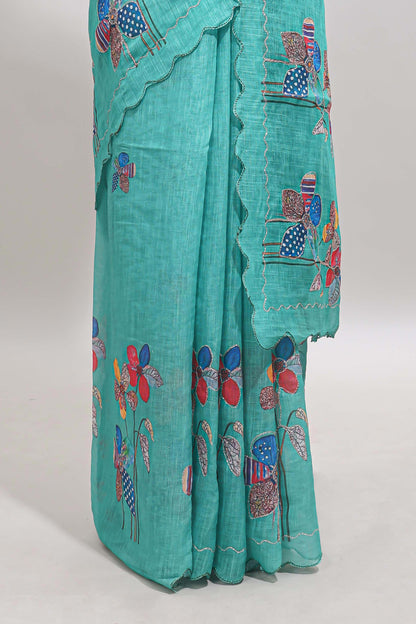 Green floral design linen cotton saree with scallop border and matching printed blouse