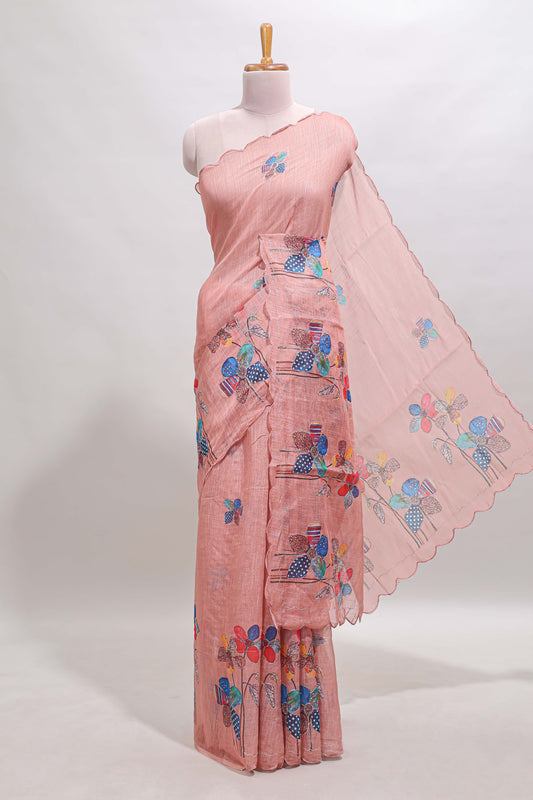 Peach floral design linen cotton saree with scallop border and matching printed blouse