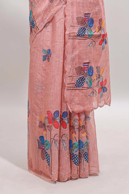 Peach floral design linen cotton saree with scallop border and matching printed blouse